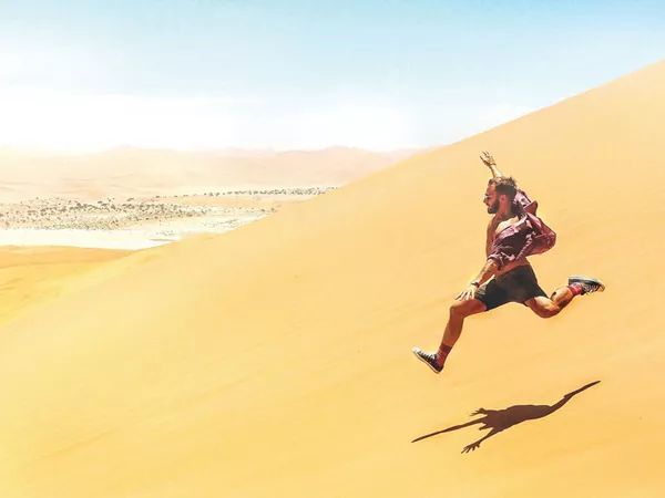Man Jumping Dessert Namibia