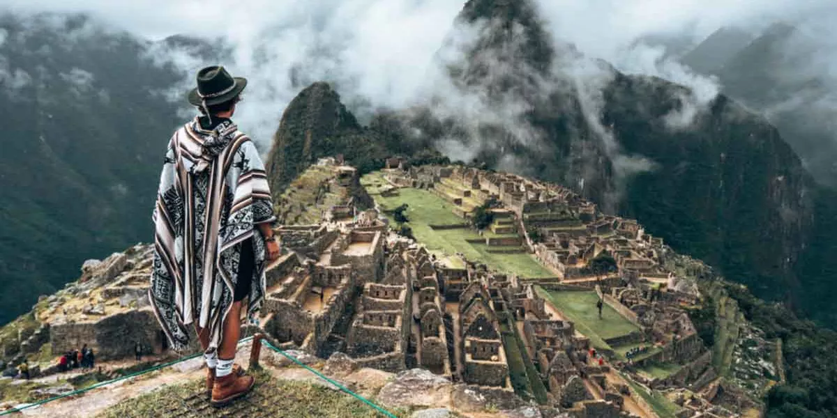 Male Looking Over Machu Picchu