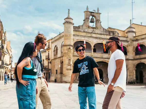Friends Talking And Smiling