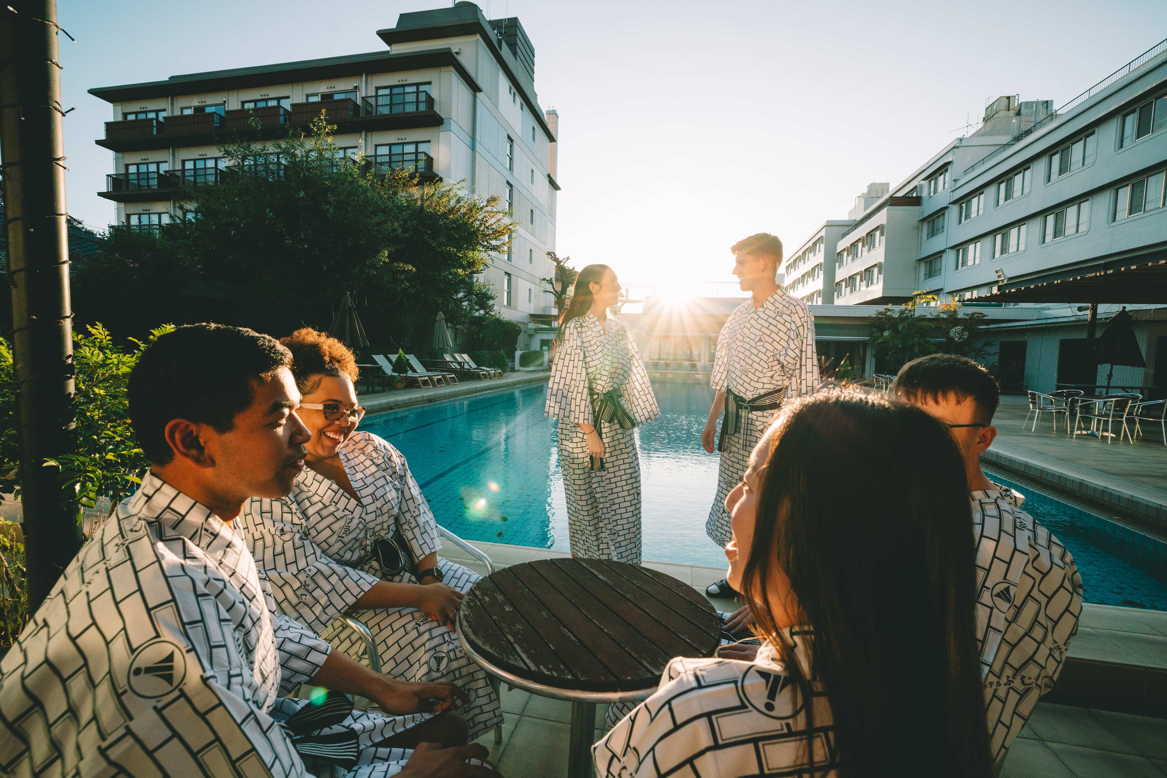 Group Talking By The Pool