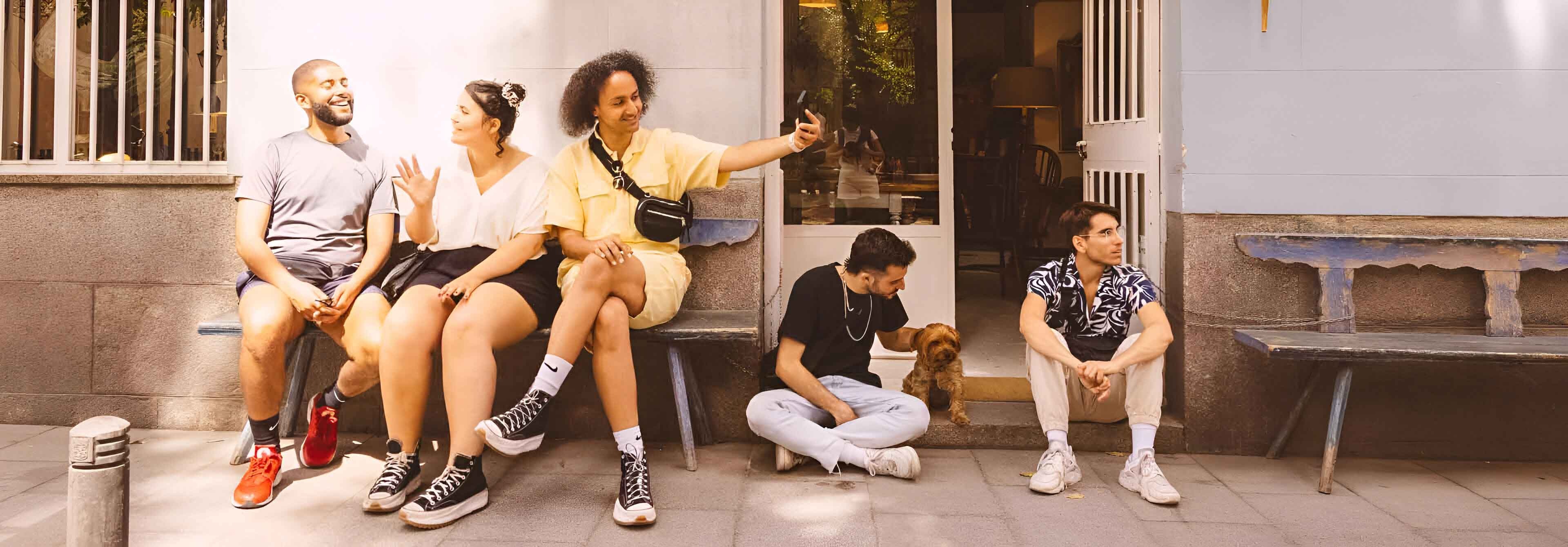 Groupd Of Friends Sitting And Taking A Selfie