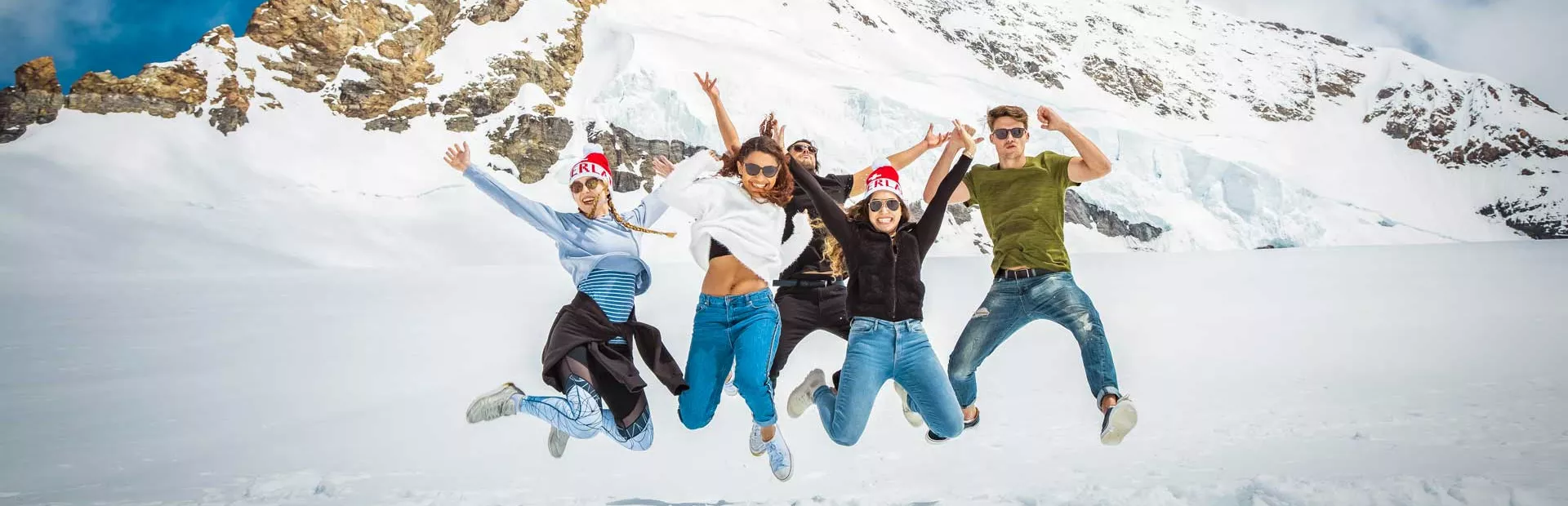 Group Jumping Together In The Snowy Mountains 0355EURS2019