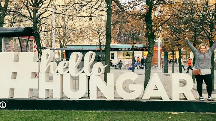 Traveller at the Hello Hungary sign in Budapest, Hungary