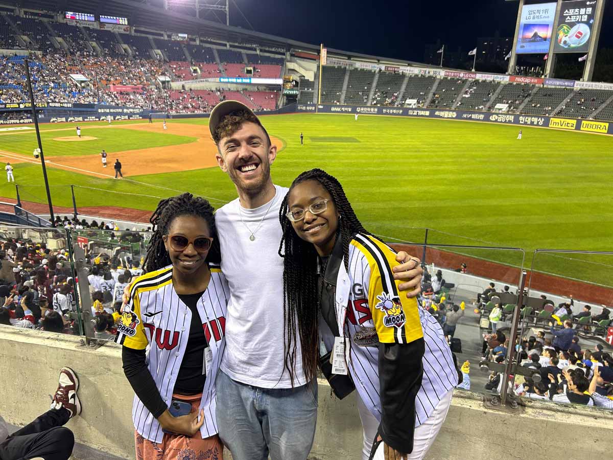 Three Friends In A Baseball Game in South Korea.
