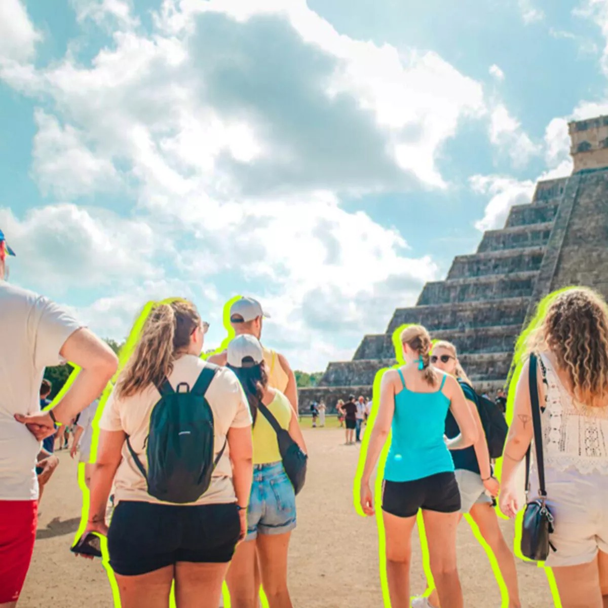 Group of tourists next to Chitzen Itza in Mexico