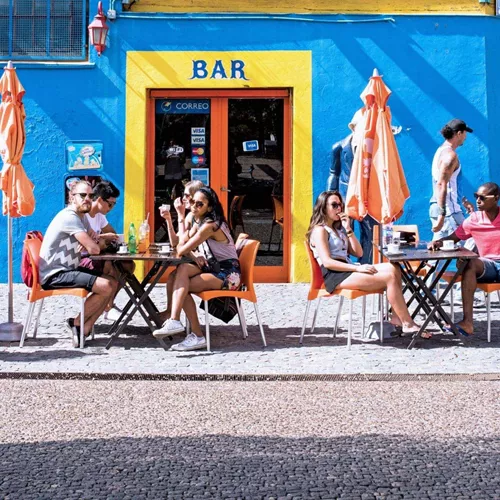 The colourful streets of Buenos Aires' La Boca neighbourhood, where Contiki travellers stop for coffee on Contiki's Lima to Buenos Aires Tour