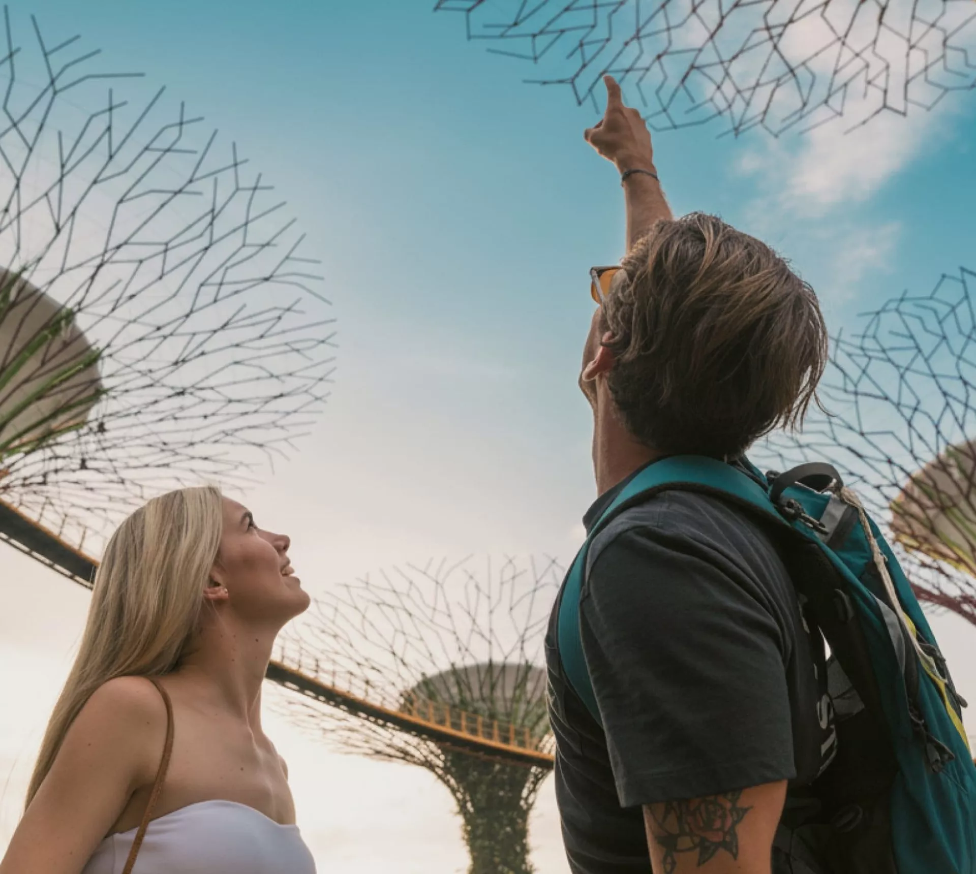 Travellers looking up at the Supertree Grove in Gardens by the Bay, Singapore - Contiki Best of Malaysia & Singapore Tour