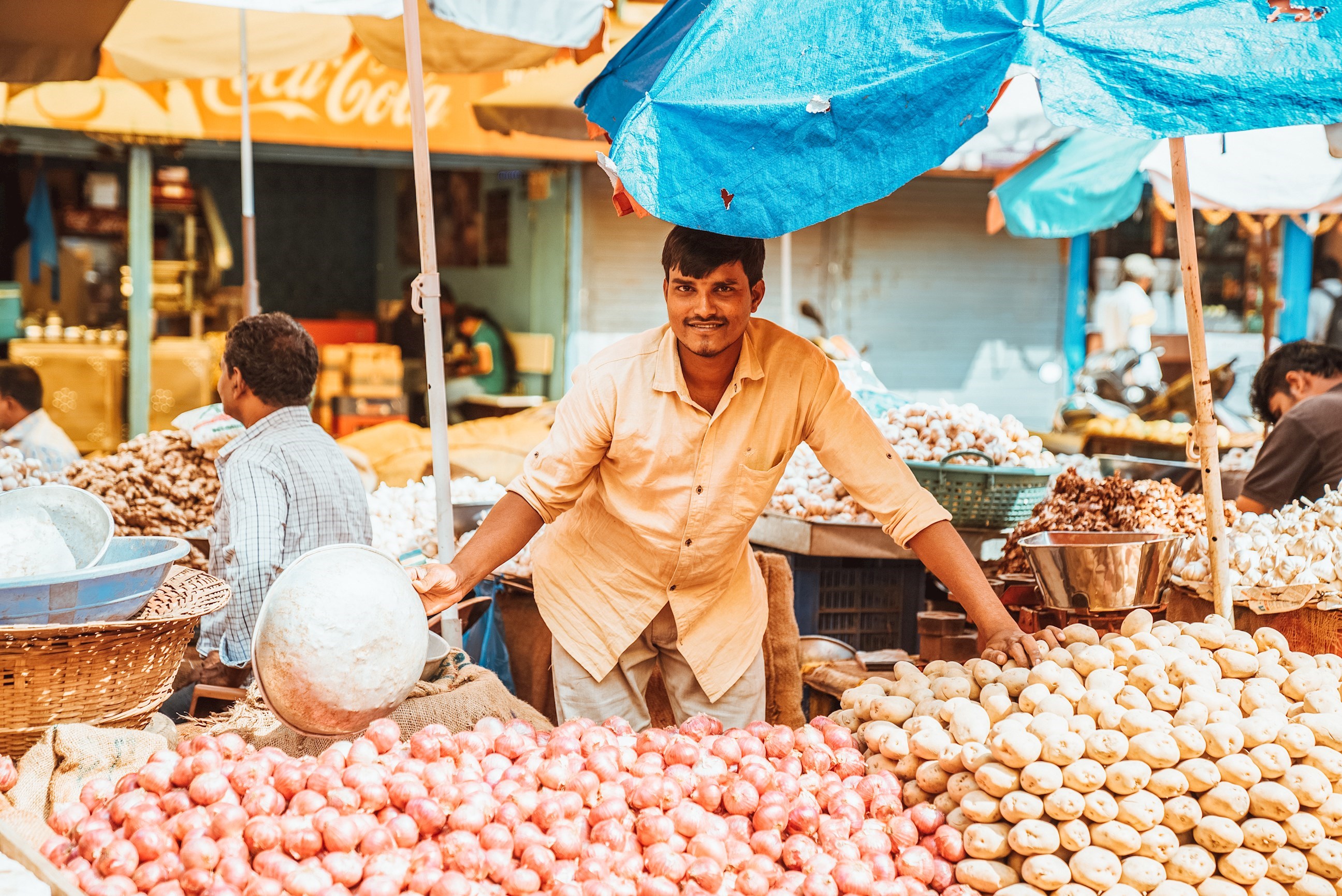 A local with at a market stall in Mumbai, India