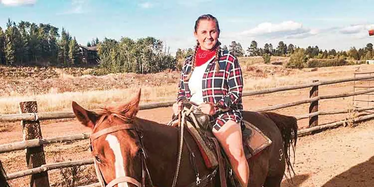 Female On Horseback At Yellowstone National Park Usa