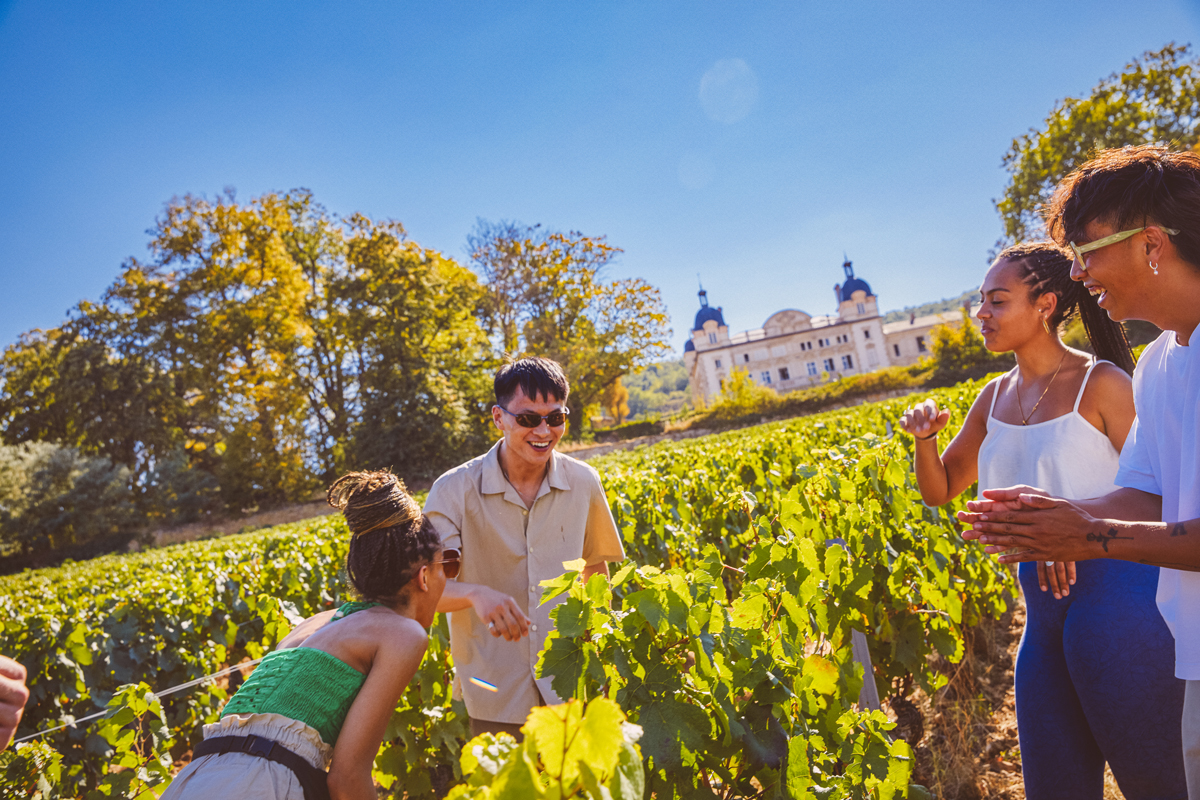Friends Laughing In Chateau Garden