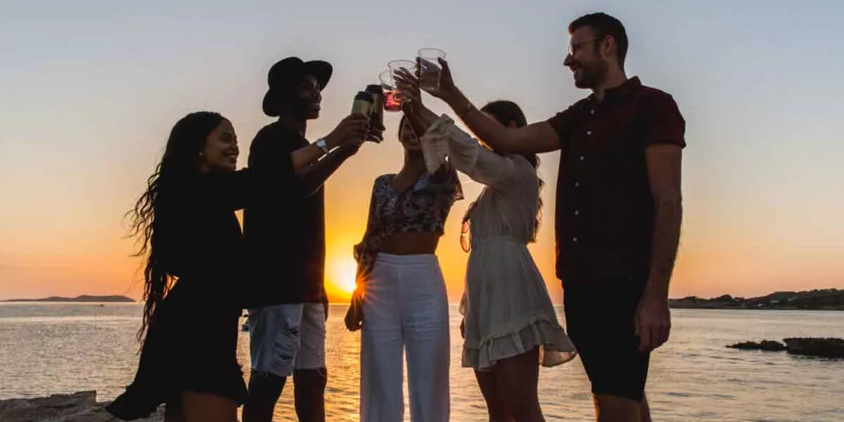 Toasting On The Beach At Sunset