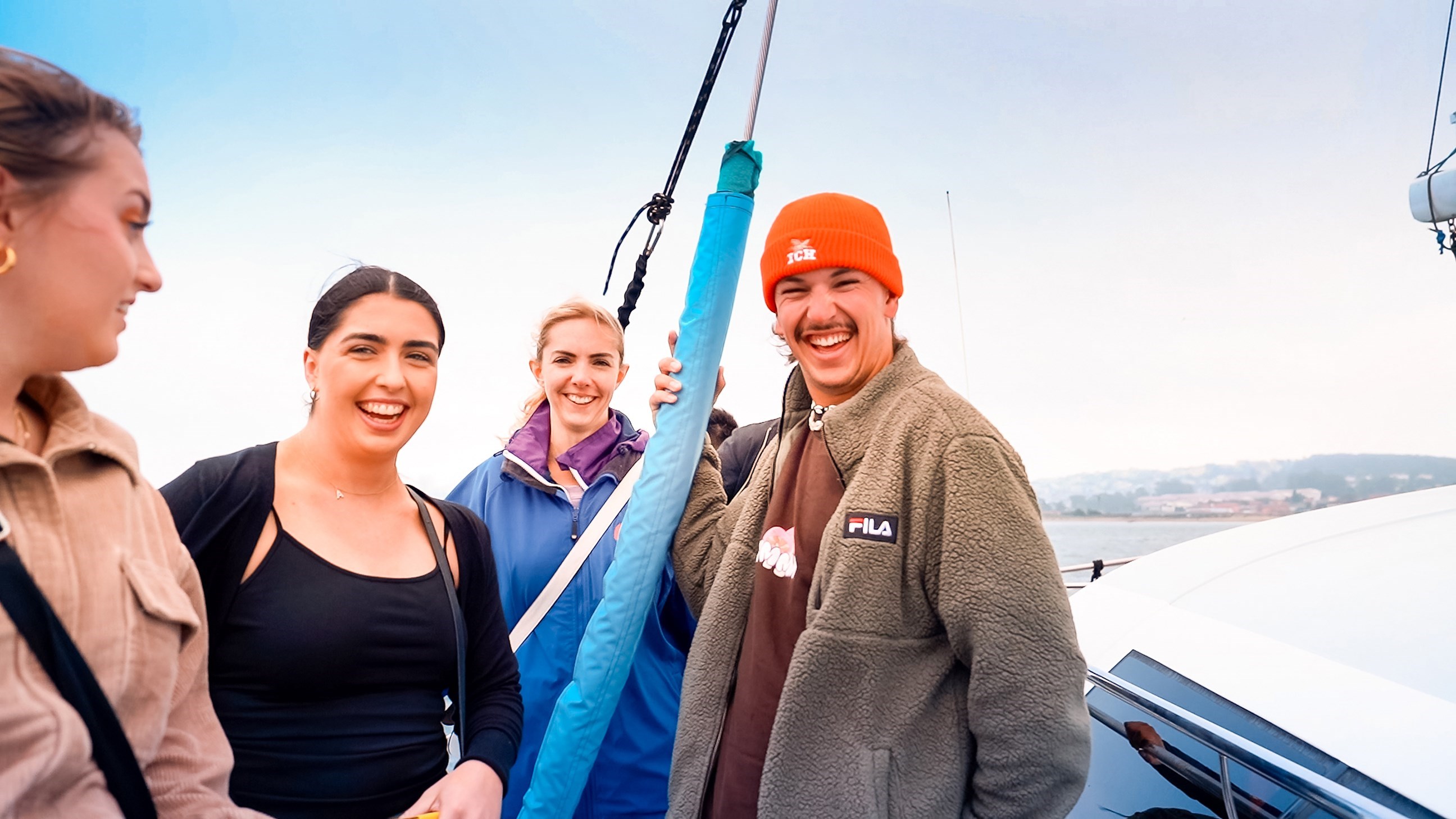 Travellers Smiling for Photo During a Sunset Cruise in San Francisco, USA