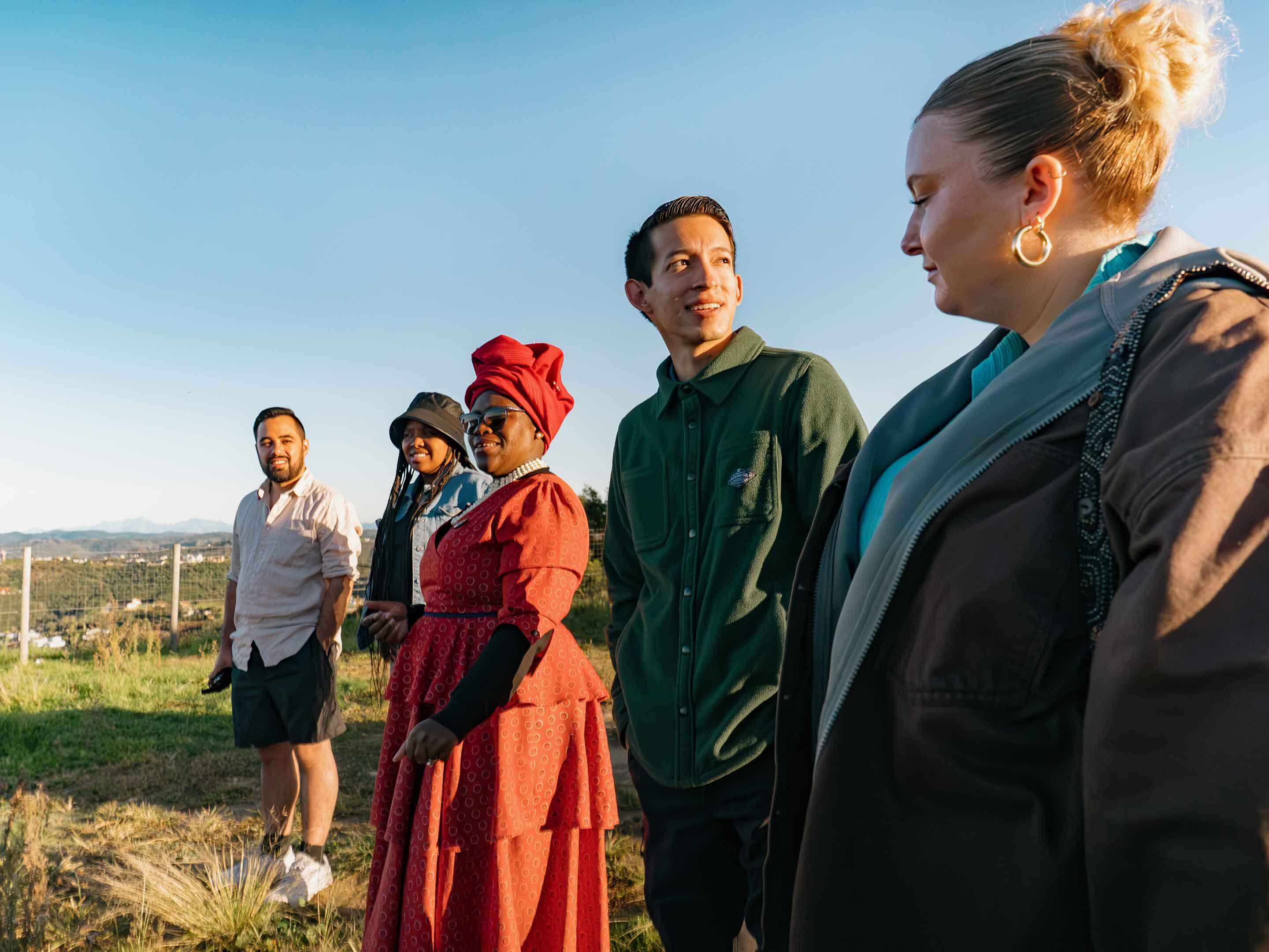 A group of people standing in a field