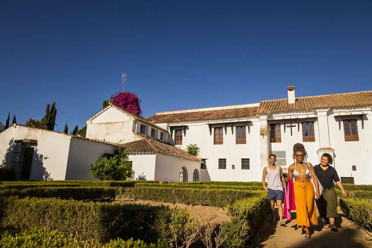Travelers Outside Villa In Portugal