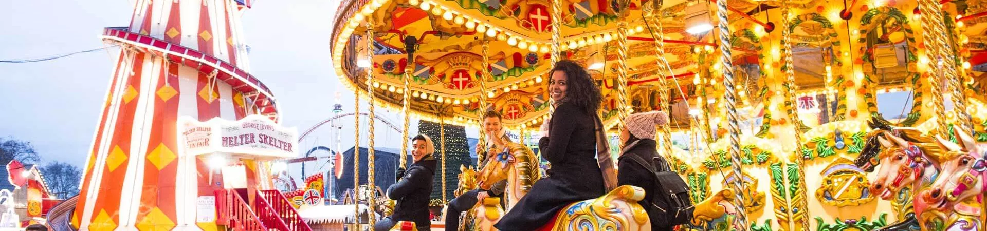 Group On Carousel At Christmas Market London 0143EURW2018