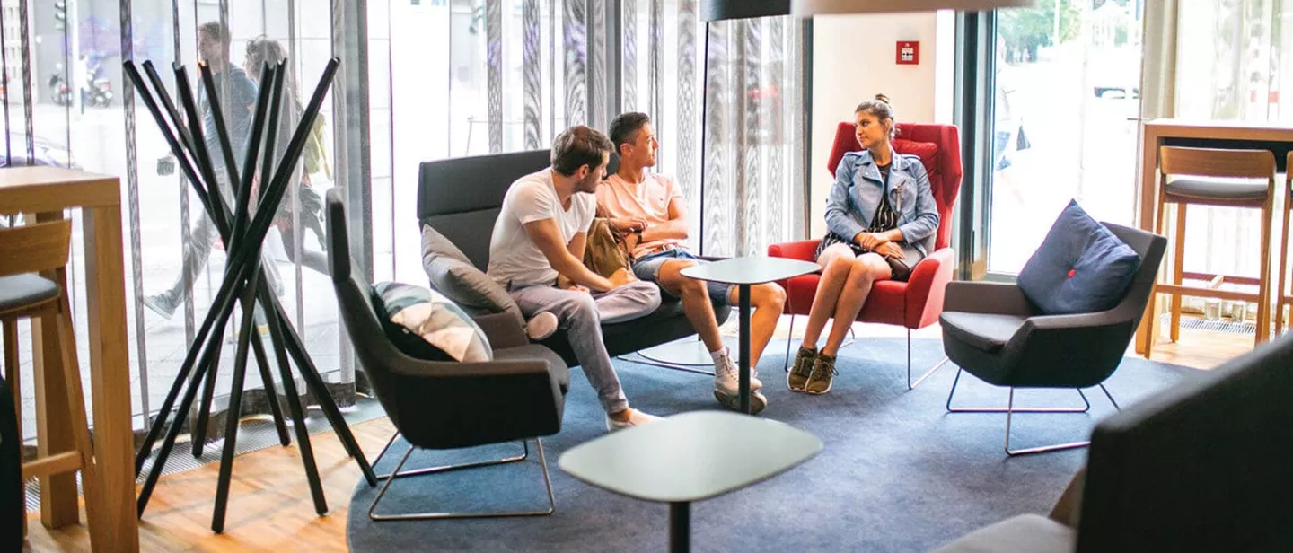 Tourists resting in the hotel lounge