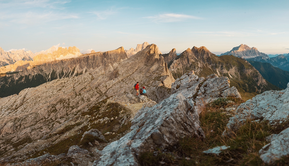 Travellers Hiking Dolomites Mountains Sunset