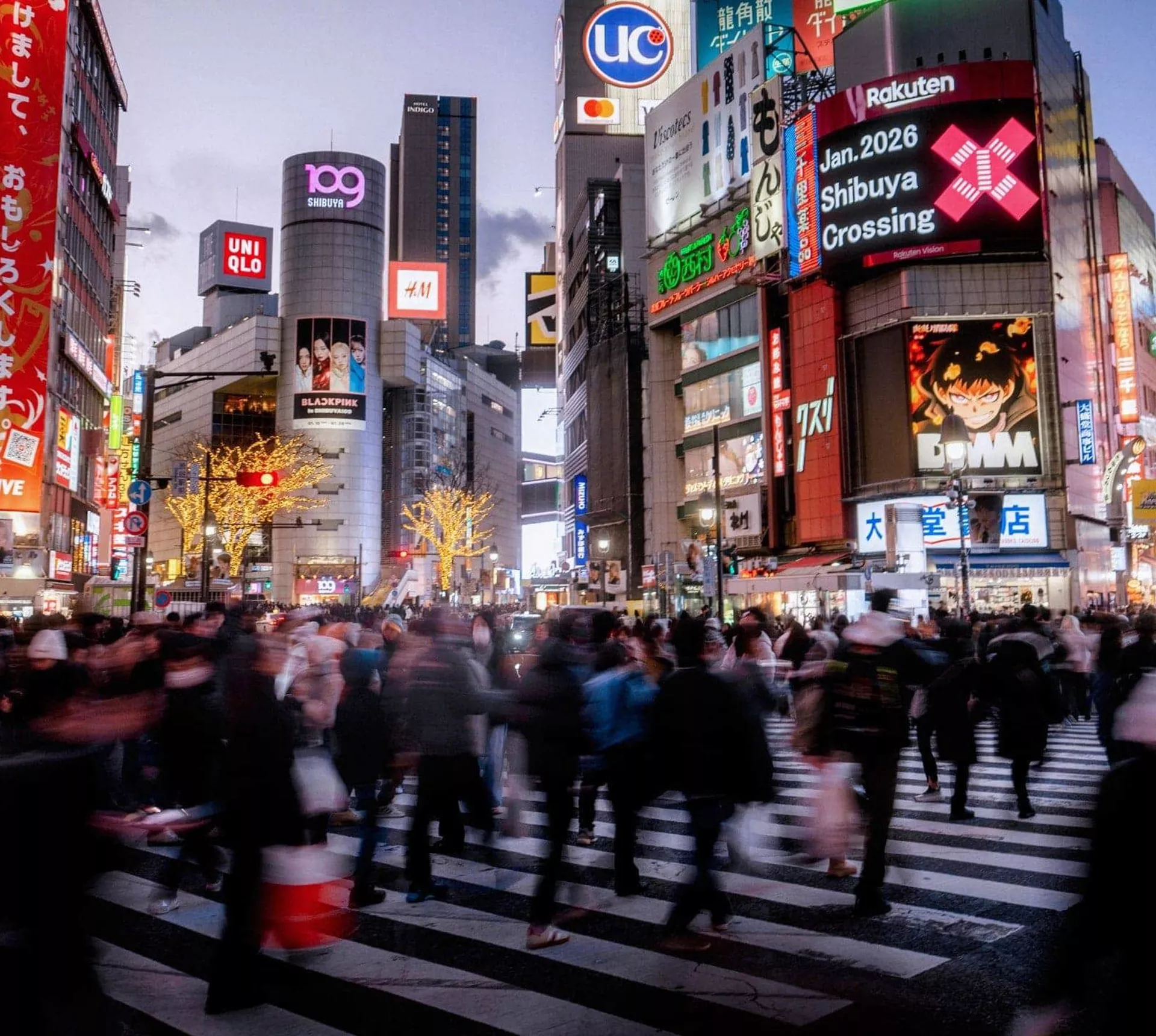Shibuya Crossing illuminated at night in Tokyo, Japan, on Contiki's Japan in a Week 35 to 45 Tour