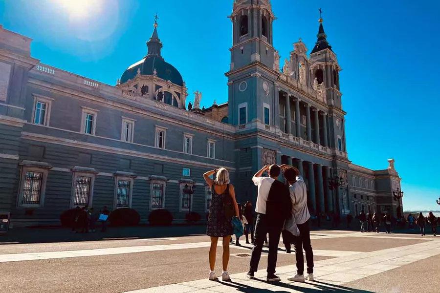 Travelers In City Monument Madrid