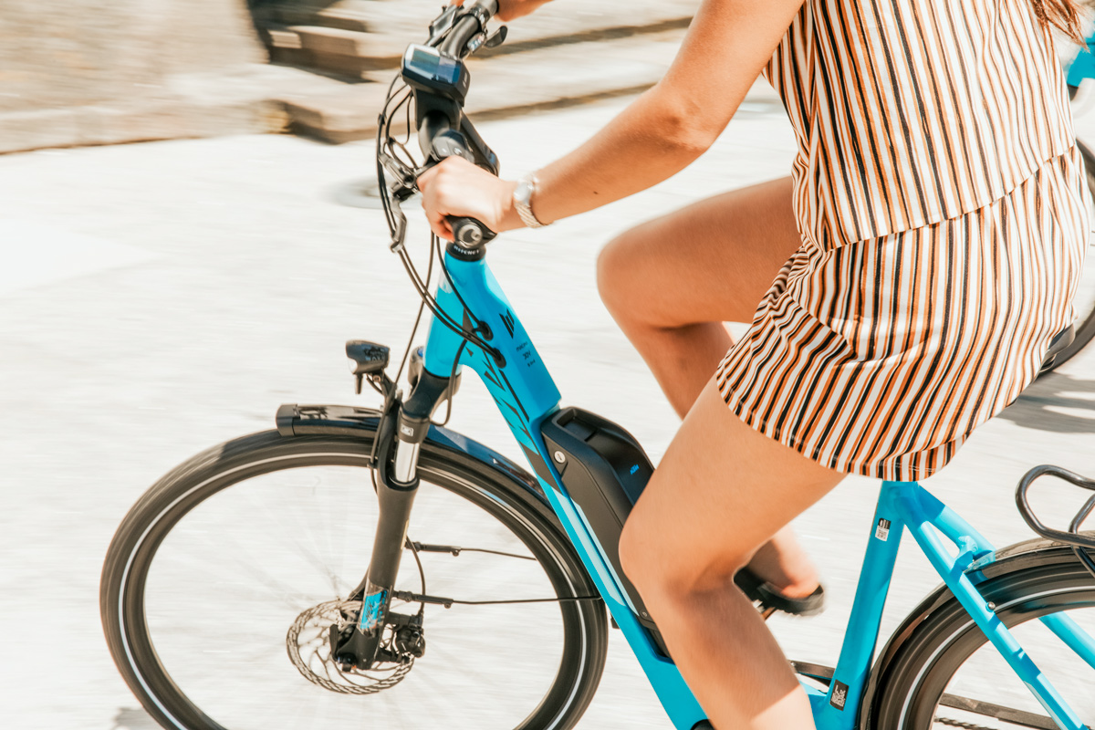 Person Riding A Bike