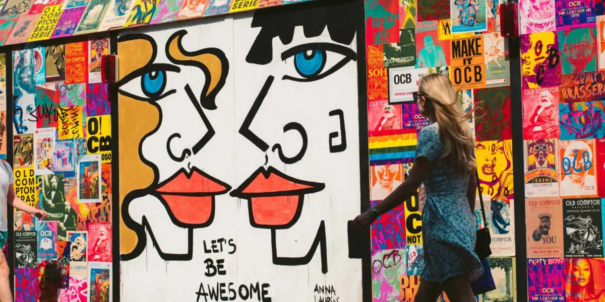 Girl Walking Past Wall Of Art