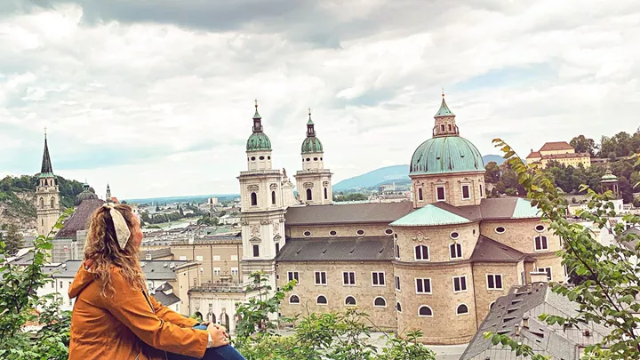 Contiki Trip Manager looking at Salzburg Cathedral in Austria