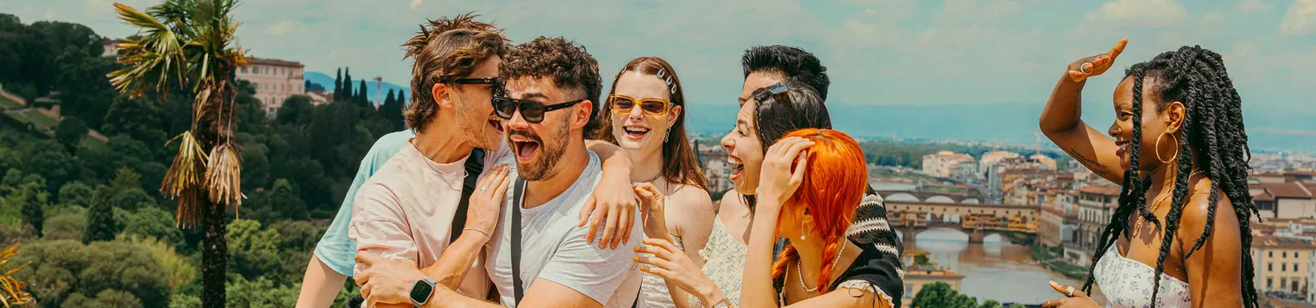 Group Of Young Travelers Having Fun In The Sun In Italy