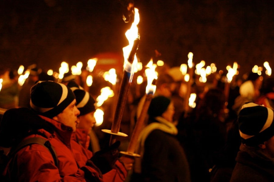 People with light torches 
