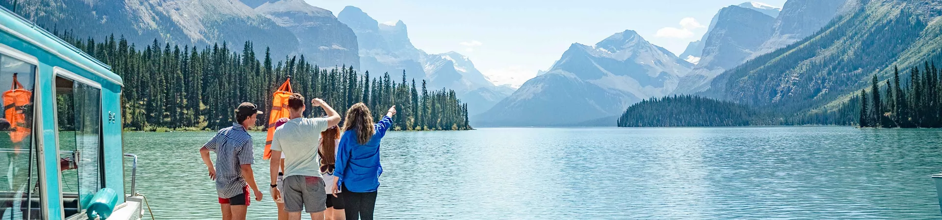 Travelers At Lake In Canada looking into the distance