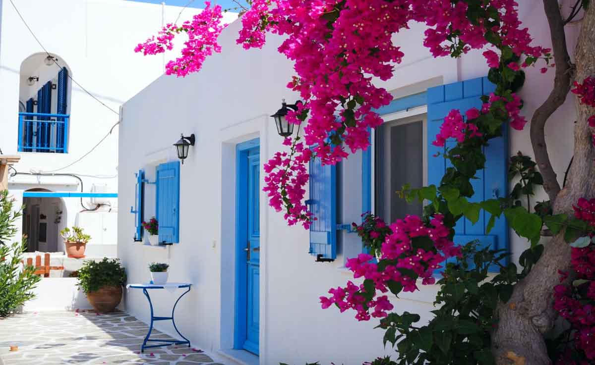 White Greek Villa With Blue Door