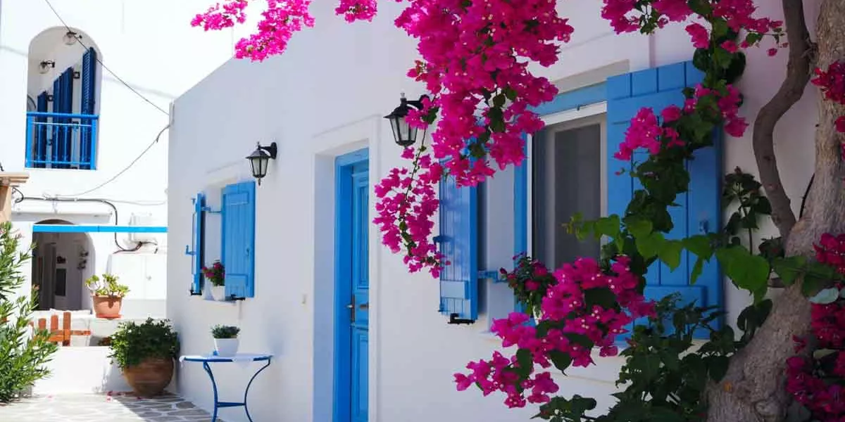 White Greek Villa With Blue Door