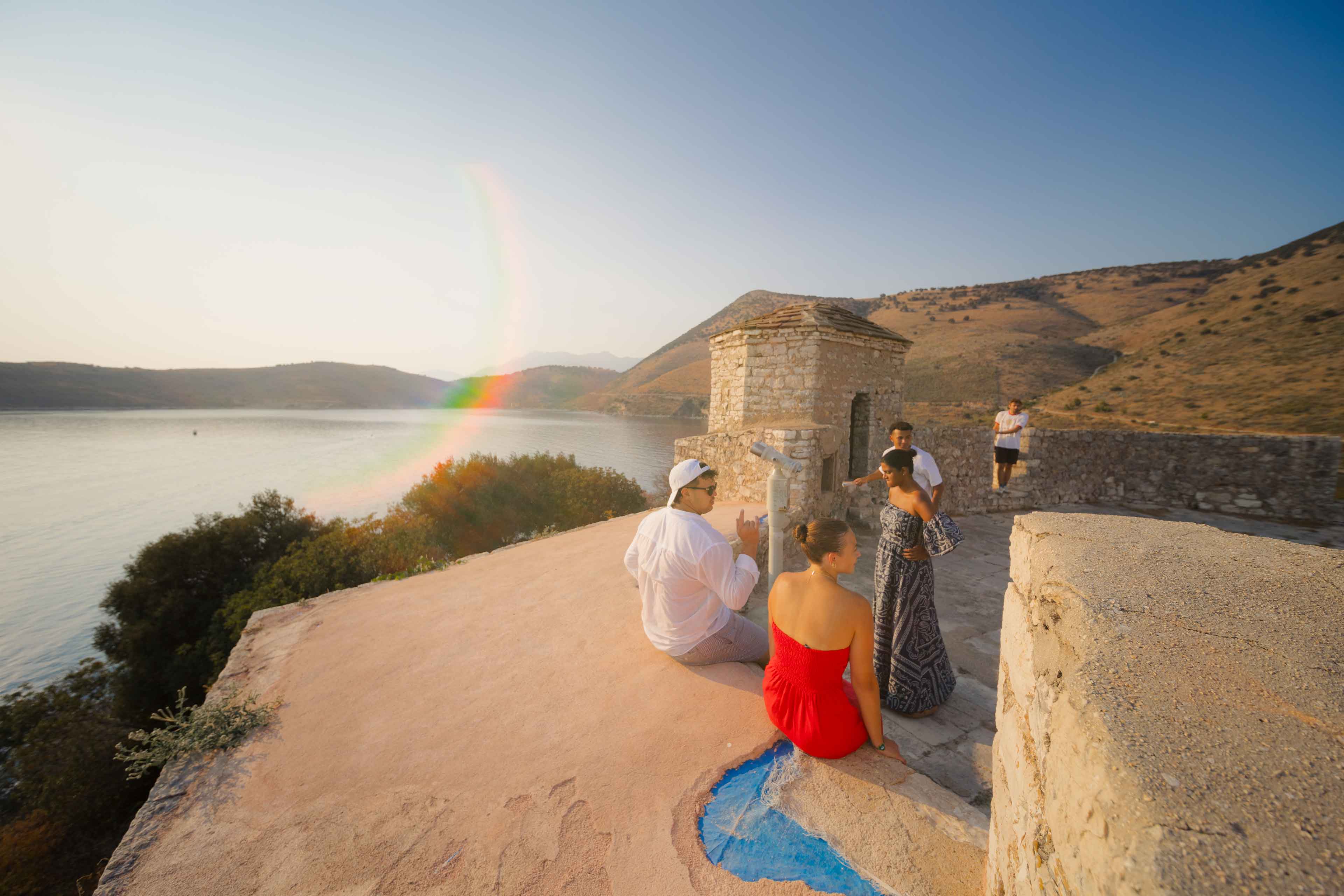 Group Of Young Travelers Exploring Porto Palermo Albania
