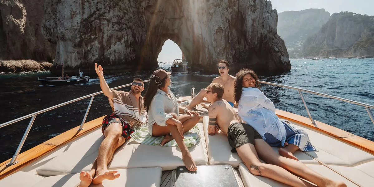 Friends Talking And Smiling Boat Sunny Day Blue Sea