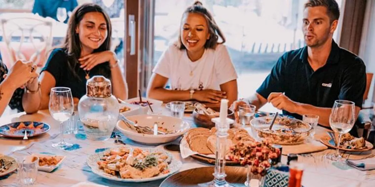 Group eating dinner in a restaurant