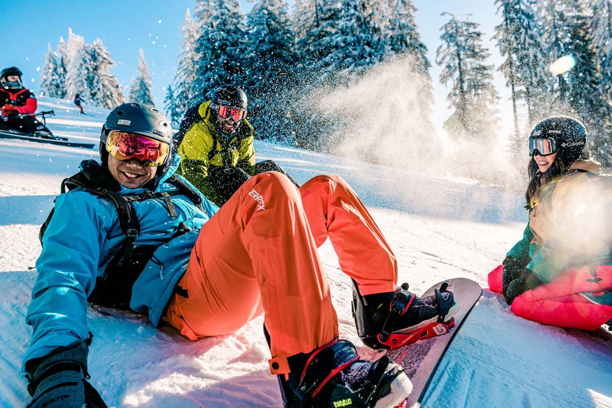 People Skiing And Smiling