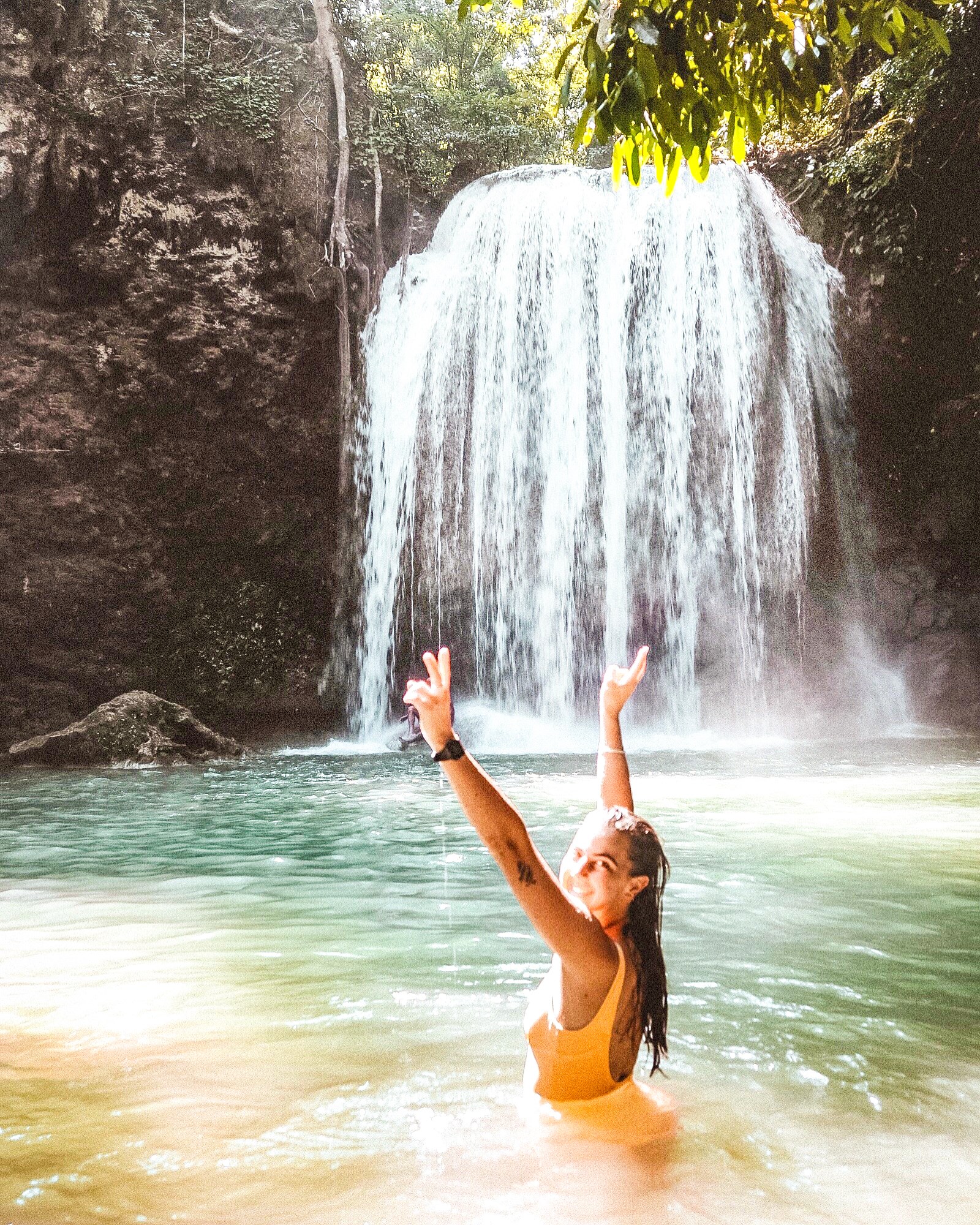 A Traveller at Kuang Si Waterfall in Luang Prabang in Laos