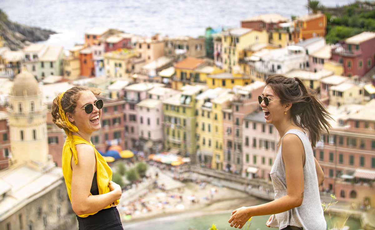 Two Females Laughing Over Cinque Terre Italy
