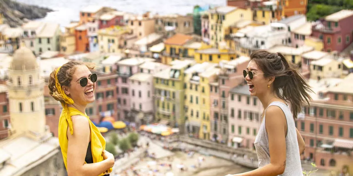 Two Females Laughing Over Cinque Terre Italy