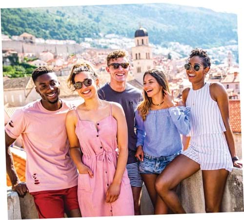 Smiling tourists posing for a photo