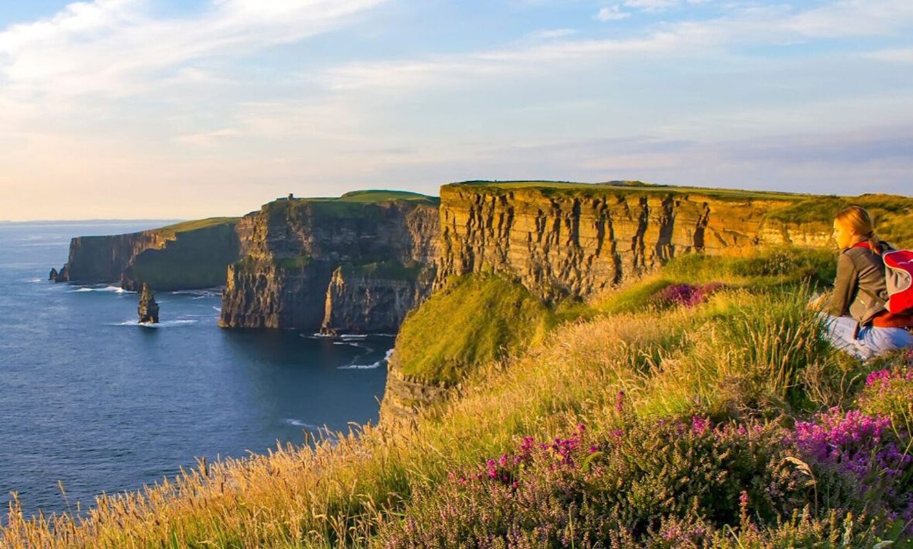 Woman On Cliffs In Ireland