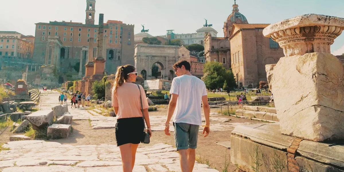 Contiki travellers exploring the Roman Forum in Rome, discovering ancient ruins and iconic landmarks on the Rome, Athens & Cairo 35 to 45 Tour
