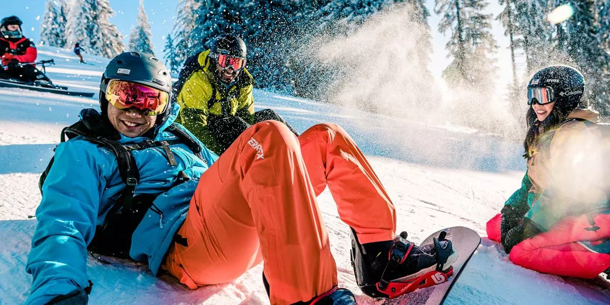People Skiing And Smiling