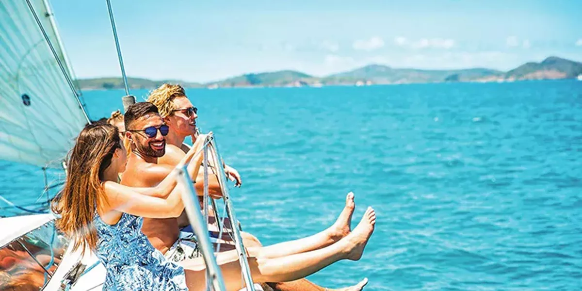 Travellers sailing around Whitsunday Islands, Australia