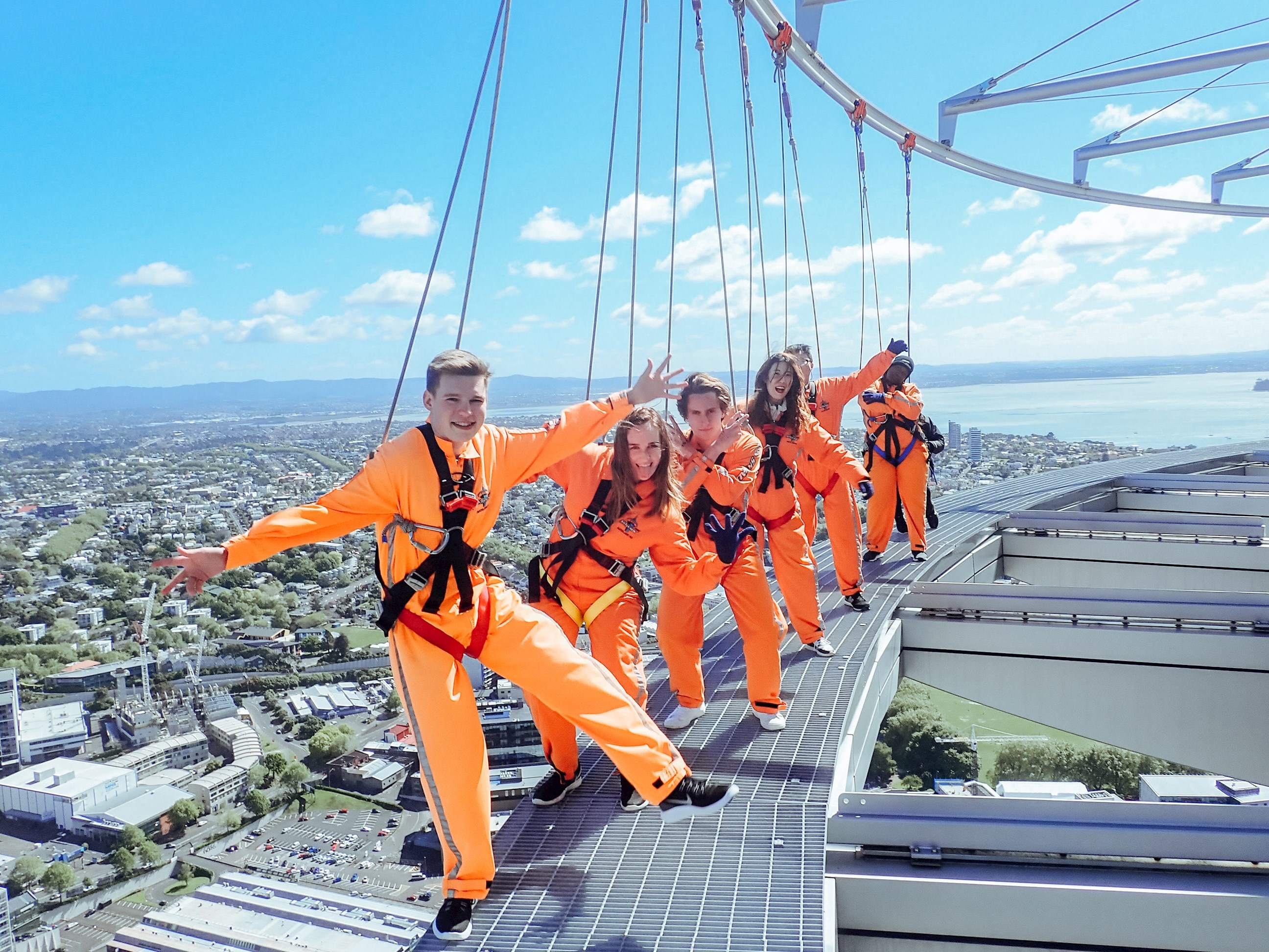 Travellers during the Sky Walk around the Sky Tower in Auckland, New Zealand