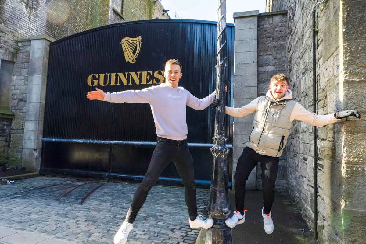 Travelers Outside Guinness Factory Dublin Ireland