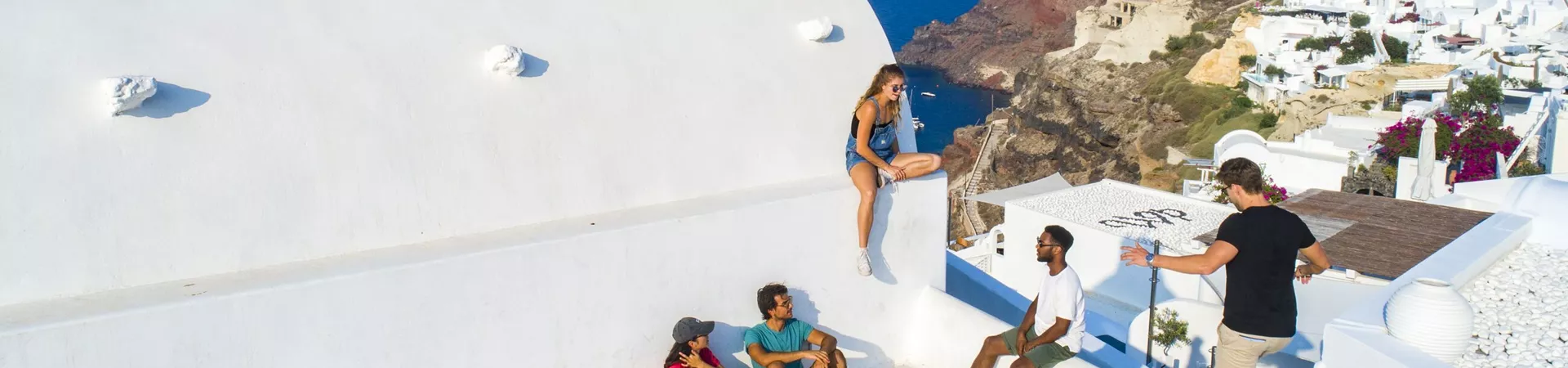 Travellers relaxing on a Greek island