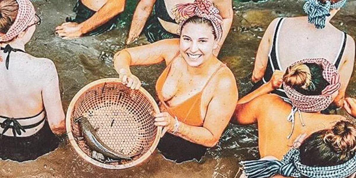 A group of women standing in the Mekong river