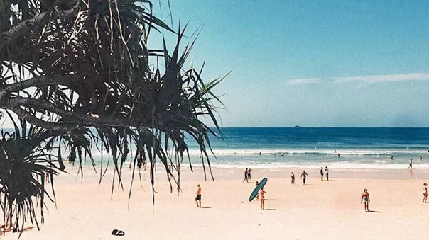 Tourists on Byron Bay beach
