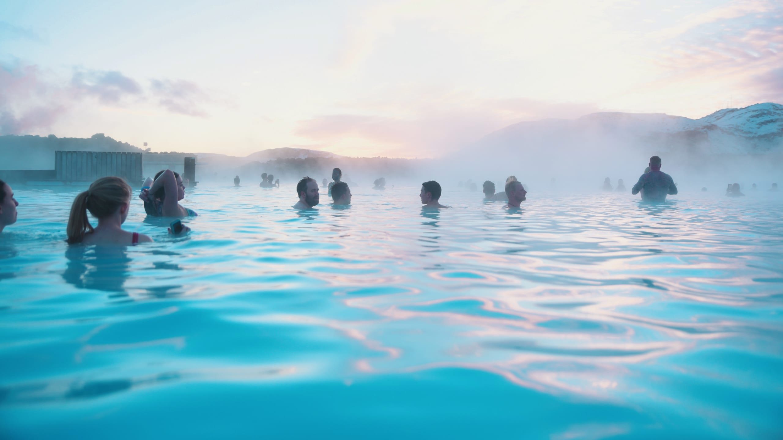 Contiki travellers bathing in the Blue Lagoon geothermal spa in Iceland - Contiki Best of Iceland Tour