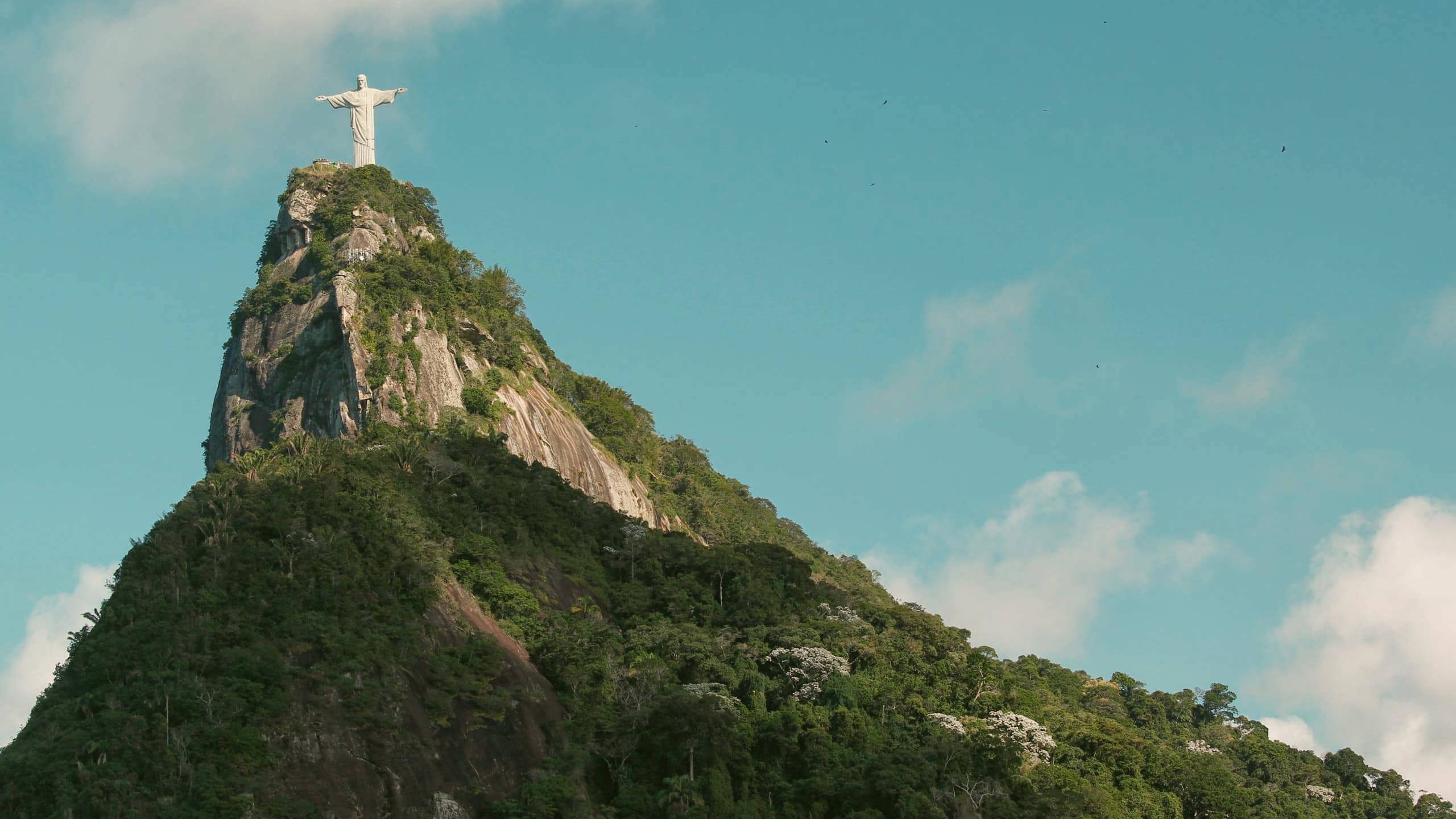 Christ the Redeemer overlooks Rio de Janeiro from Corcovado Mountain on the Contiki Best of Argentina & Brazil Tour